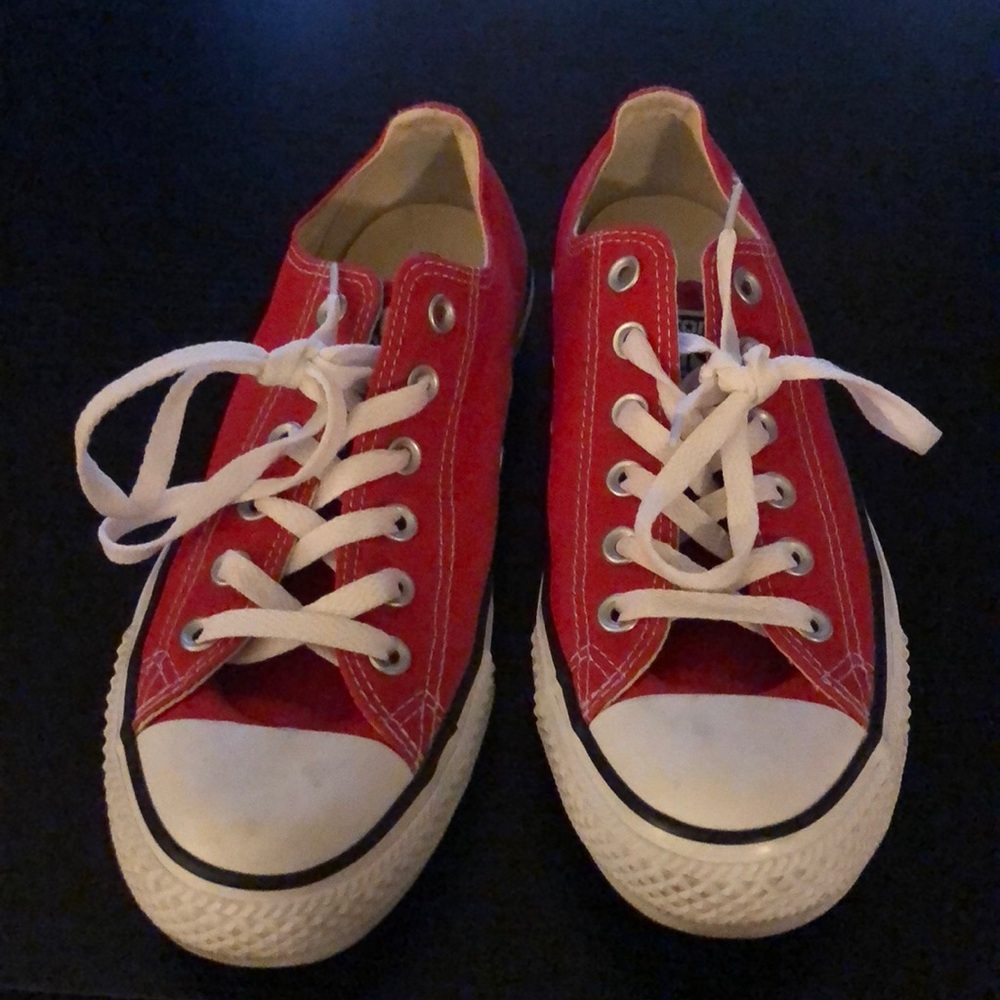 Red and white Chuck Taylor sneakers